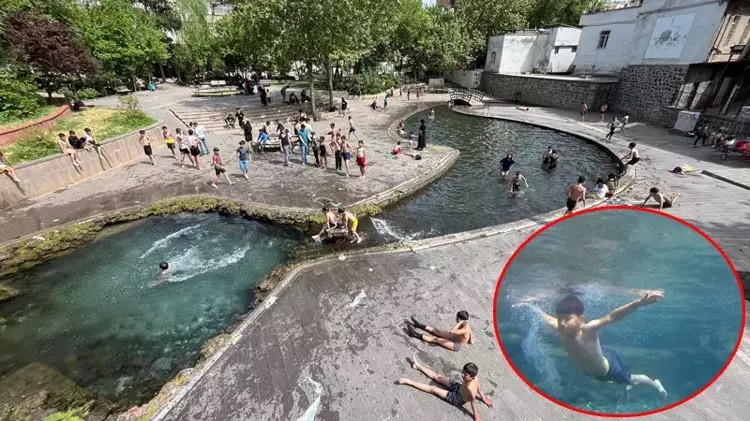 Diyarbakır’da yasağa rağmen süs havuzunda çocukların tehlikeli serinliği